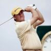 Graeme McDowell shoots ace in orange golf apparel