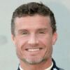 Jake Shepherd sports white golf apparel for David Coulthard challenge