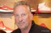 Sir Ian Botham swaps cricket whites for golf apparel