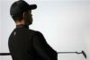 Woods' golf apparel 'coolly businesslike'