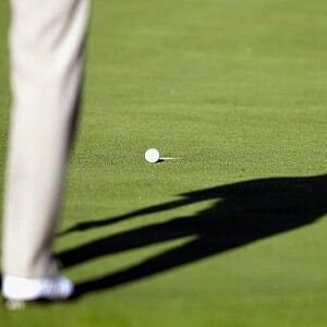 A team were suspended for removing their golf apparel.