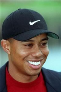 Woods looked dapper in his dark golf clothing