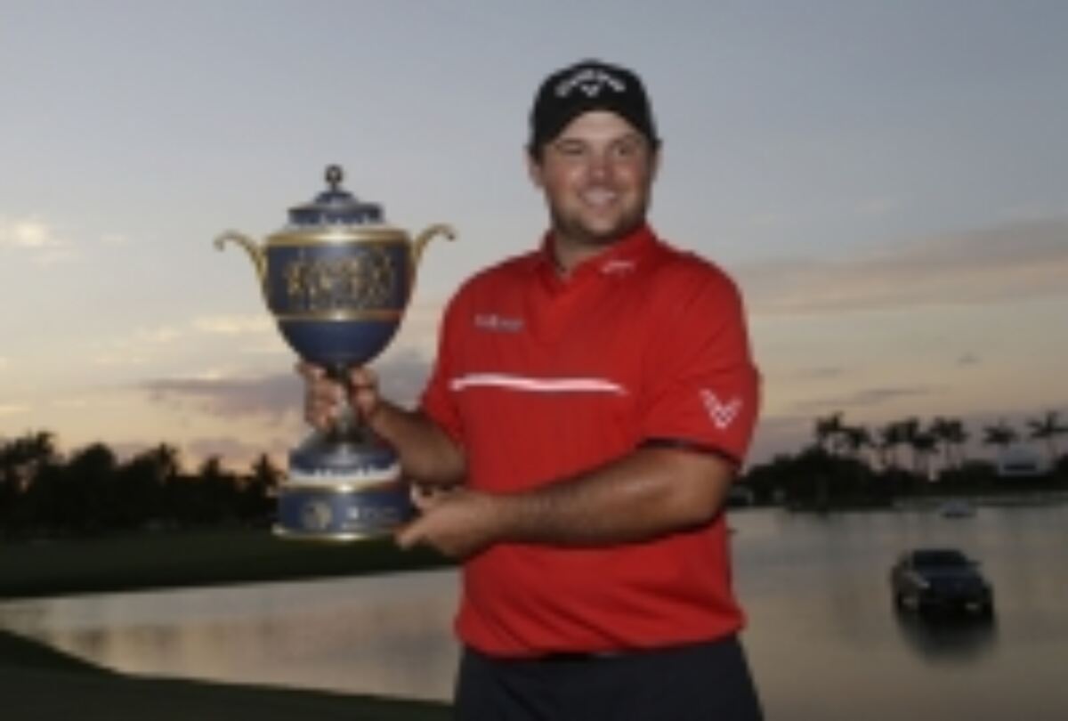 Reed hangs on to triumph in Doral