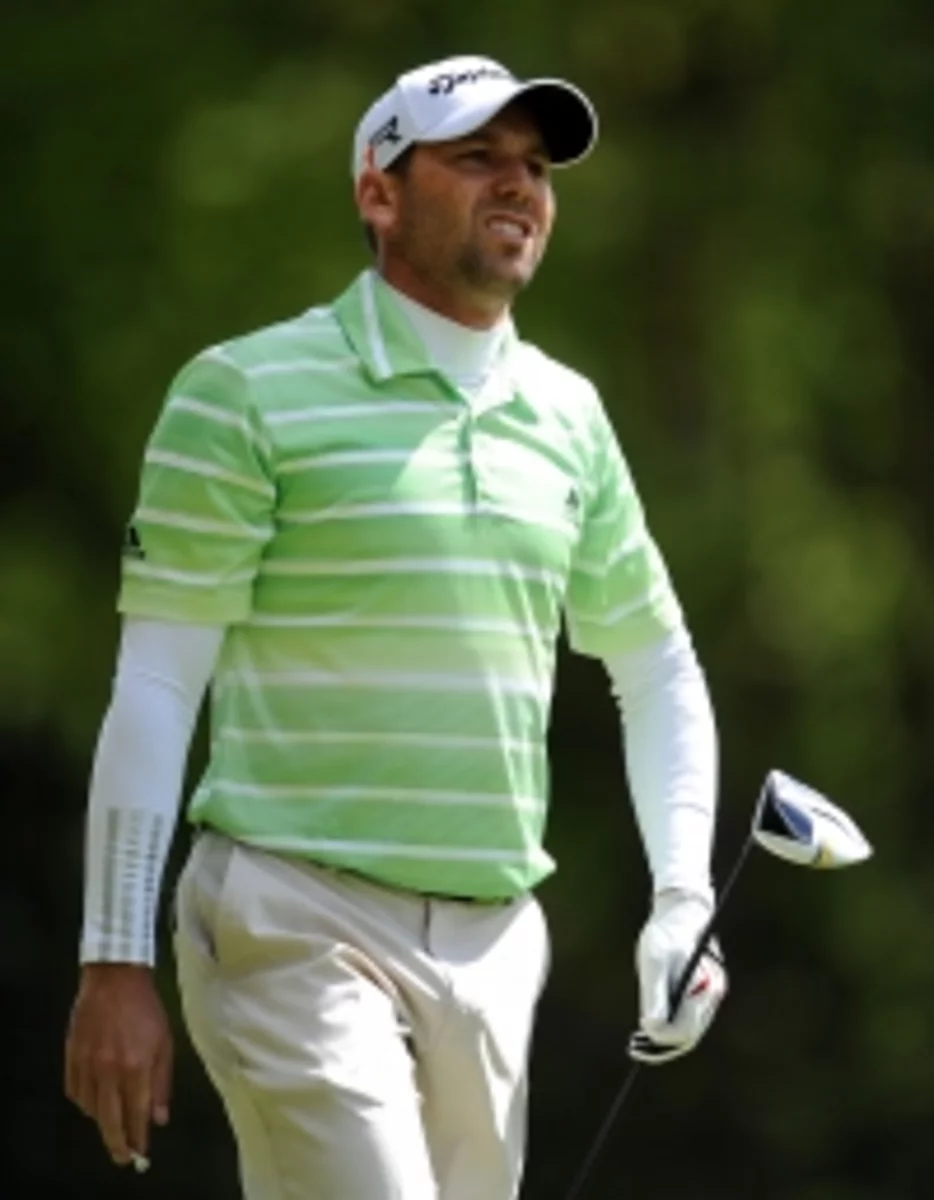 Woods accepts Garcia's handshake