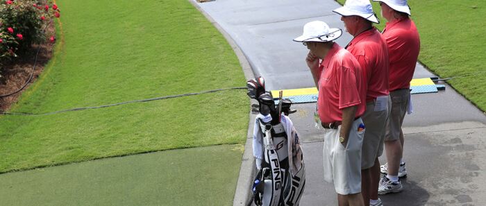 Volunteers on a golf course - How to become a volunteer at The Masters