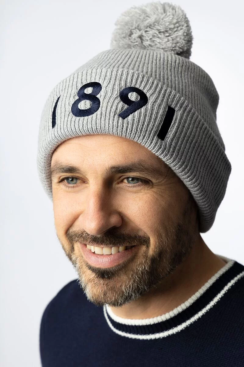 Mens And Ladies Thermal Lined Turn Up Rib Merino 1891 Heritage Bobble Hat Mens And Ladies Thermal Lined Turn Up Rib Merino 1891 Heritage Bobble Hat