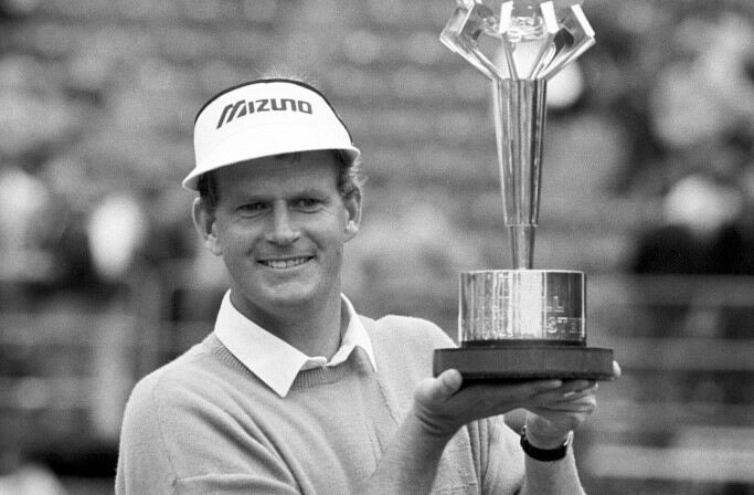 Sandy Lyle collects his well-earned British Masters trophy. PA Archive.