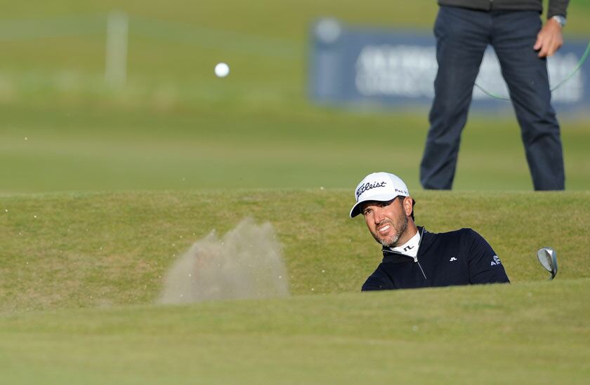 Scott Piercy plays out of the Road Hole bunker. Neil Hanna/PA Archive