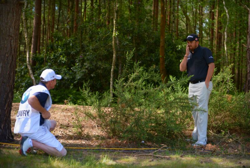 Shane Lowry gets stuck in the rough