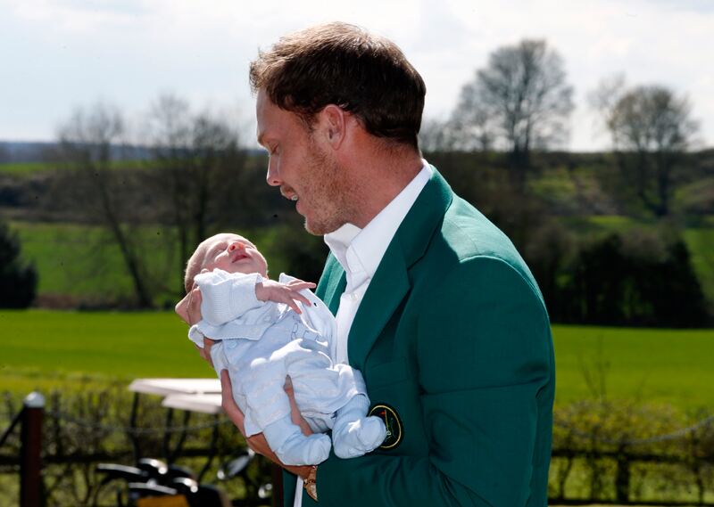 Willett opts for a classic white shirt as he poses with his new son. Peter Byrne/PA Wire
