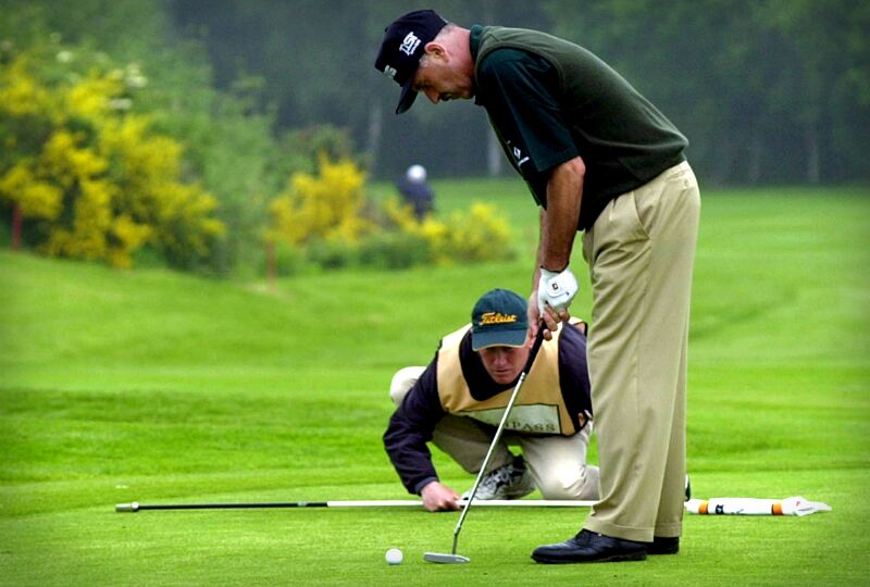 Mark James gets help lining up his shot Mark James gets help lining up his shot