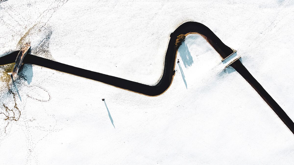 A birdseye view of a snow-covered golf course